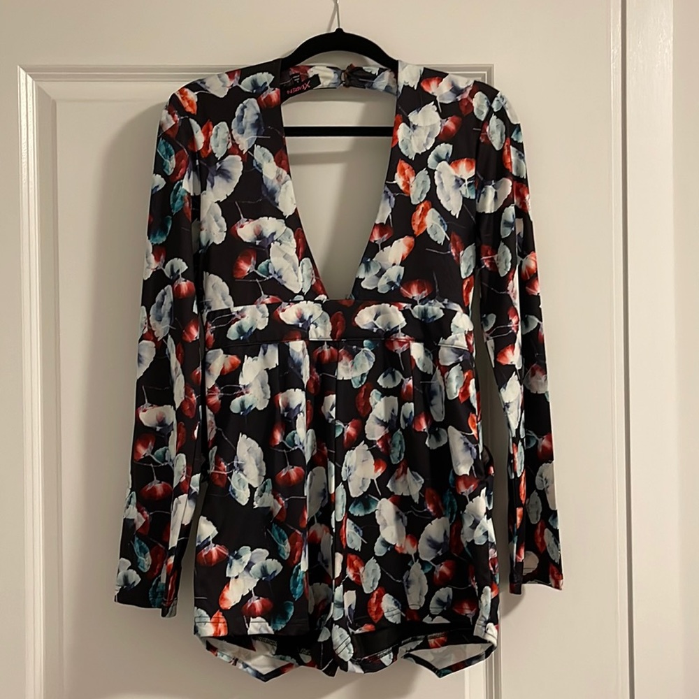 Long sleeve romper. Purchased at Once Upon a Skirt (boutique in NJ)